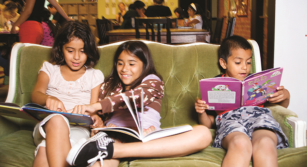 three children reading